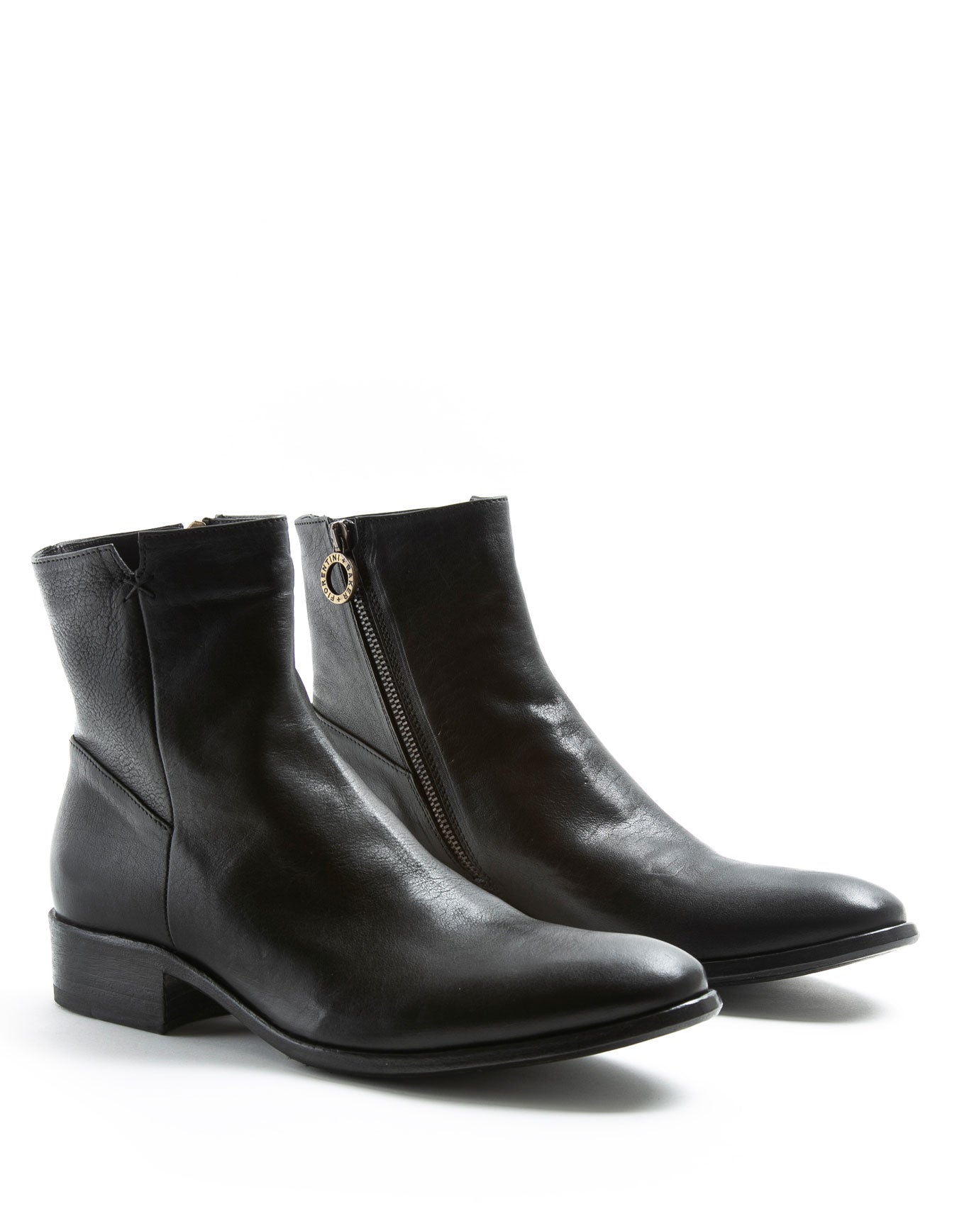 FIORENTINI + BAKER, CHANCE CALE, Leather ankle boot with inside zip. The elongated shape and stacked heel for a slick laid back rock 'n' roll look. Handcrafted by skilled artisans. Made in Italy. Made to last.