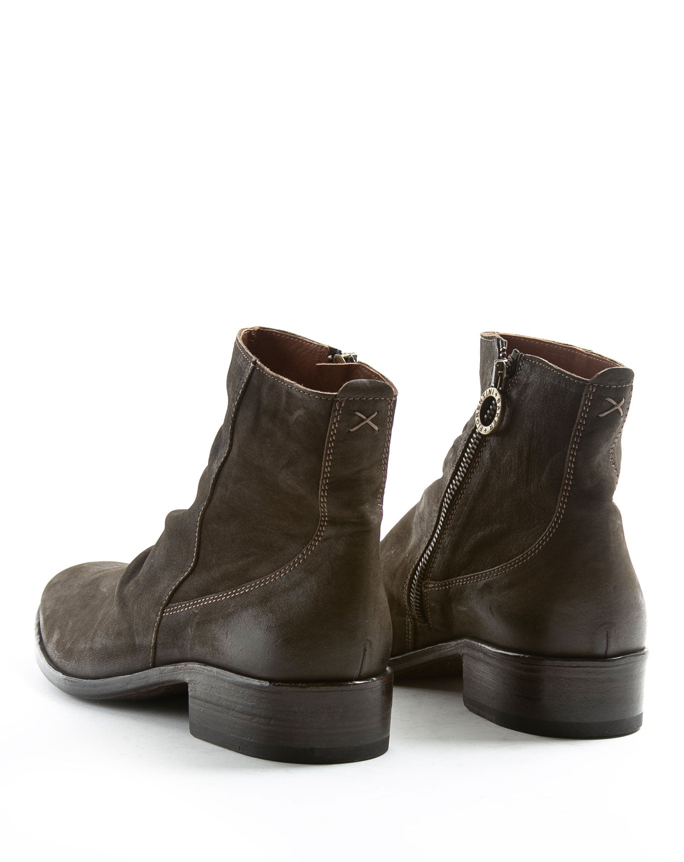 FIORENTINI + BAKER, CHANCE CLAUS, Leather ankle boot with inside zip. The elongated shape and stacked heel for a slick laid back rock 'n' roll look. Handcrafted by skilled artisans. Made in Italy. Made to last.