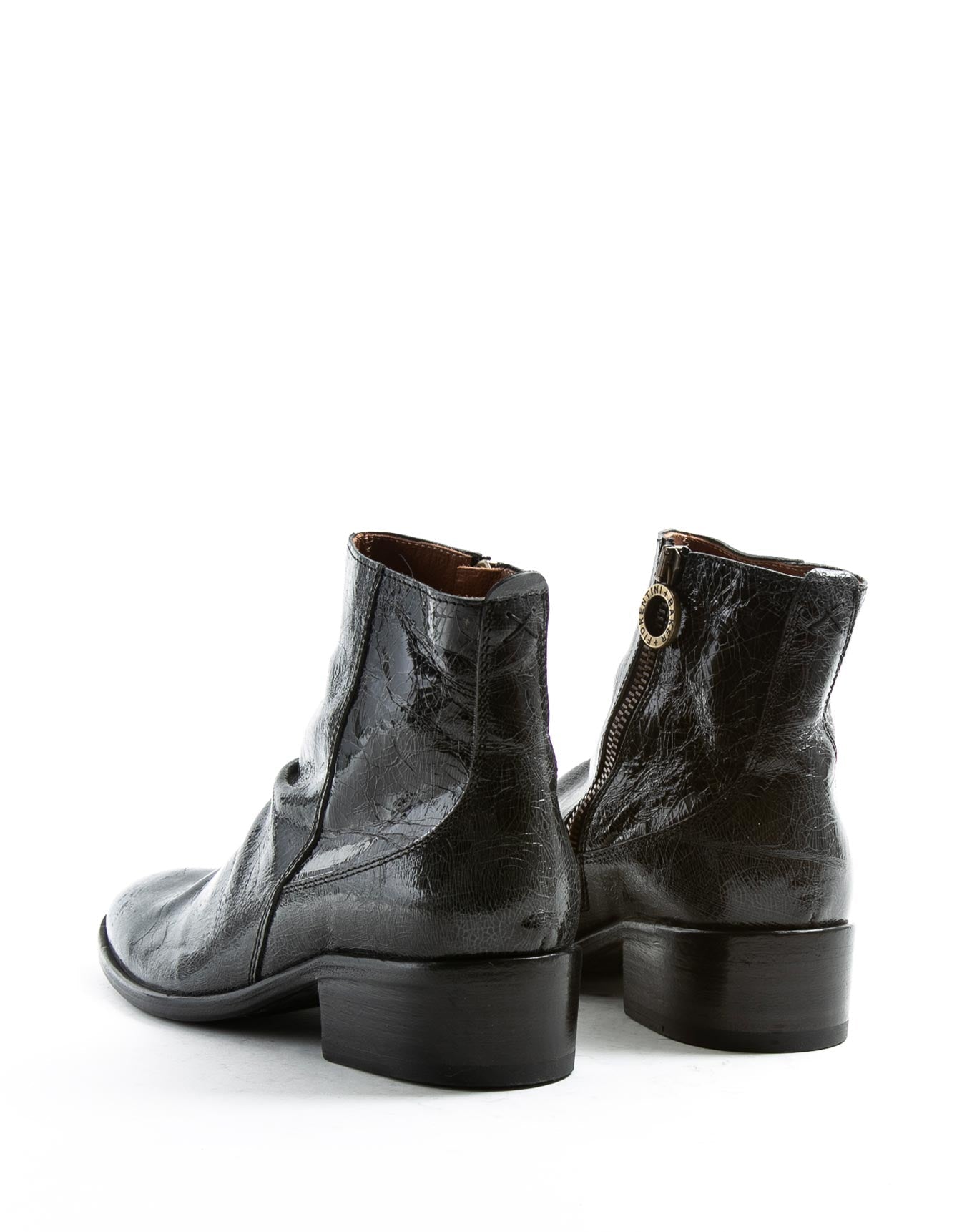 FIORENTINI + BAKER, CHANCE CLAUS, Leather ankle boot with inside zip. The elongated shape and stacked heel for a slick laid back rock 'n' roll look. Handcrafted by skilled artisans. Made in Italy. Made to last.